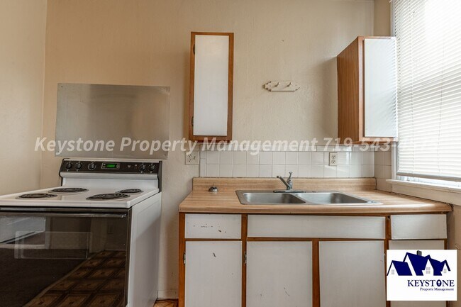 Building Photo - Ground Level, One Bedroom Apartment with A...