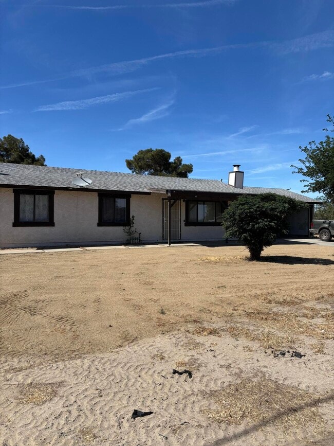 Building Photo - 10136 E Ave Q-10