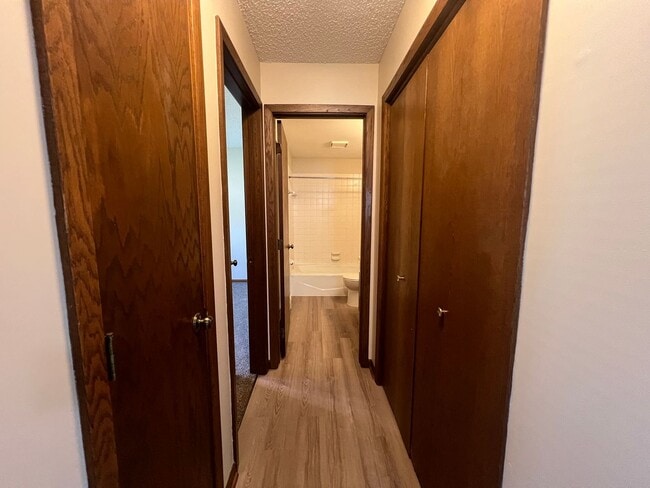 Building Photo - Fully Renovated 2-bed, 1-bath Apartment with a Garage Stall!