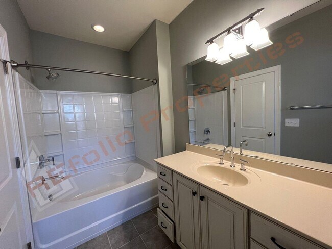 Building Photo - Elegant 3 Story 3 Bedroom Formal Model Tow...