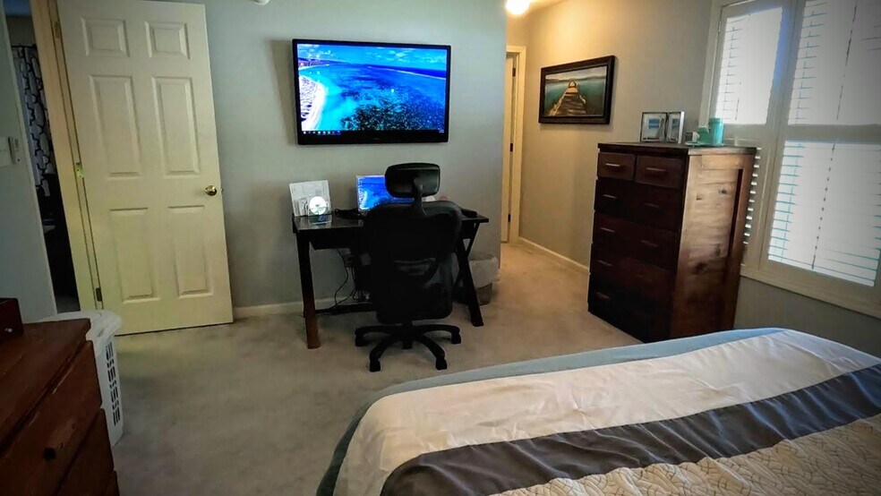 View of the master bedroom entrance and access to the spacious walk-in closet and master bath. - 424 Commerce Ave