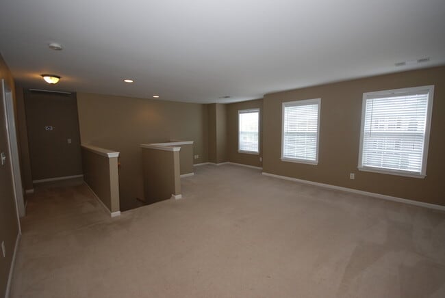 Building Photo - Oversized Executive Style Home with Finish...