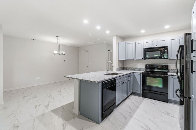 Building Photo - PENDING APPLICATION-Newly Renovated 3-Bedroom Home in Emerald Lake Colony – Move-In Special!