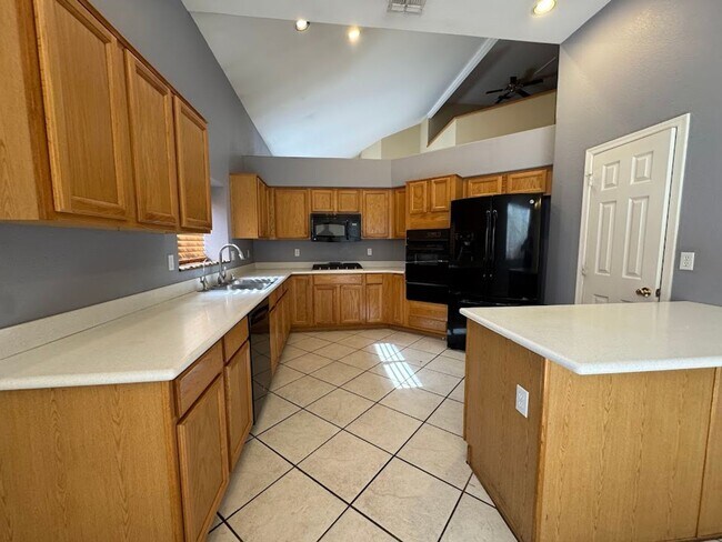 Building Photo - Spacious 4-Bedroom Home with Main-Level Primary Suite & 3-Car Garage