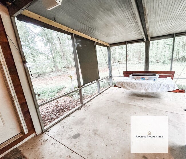 Building Photo - Your Wooded Oasis Awaits
