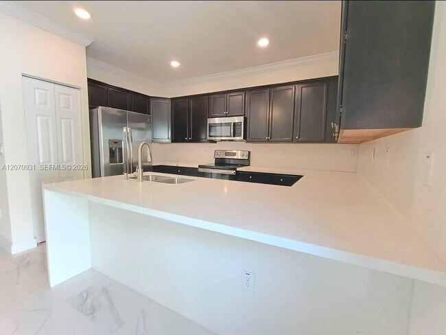 Building Photo - 9267 W 34th Ct