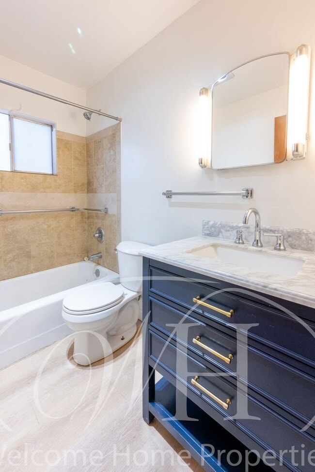 Building Photo - Comfortable 3-Bedroom Home with Fenced Yard and Attached Carport