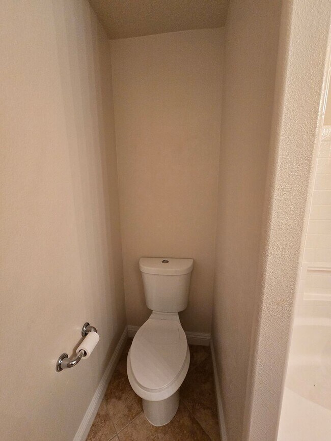 Building Photo - A Fabulous 3 Bedroom, 2.5 Bathroom, 2 Car Garage Townhome in NW Las Vegas