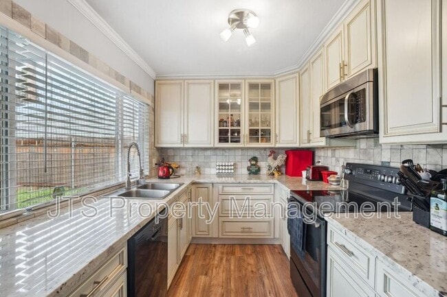 Building Photo - 6449 Feliciter Way