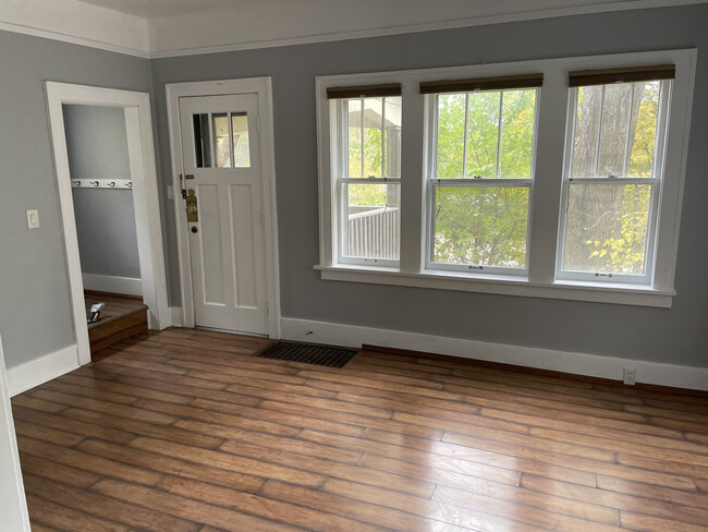 Large hard wood floored living room - 1035 N Main St