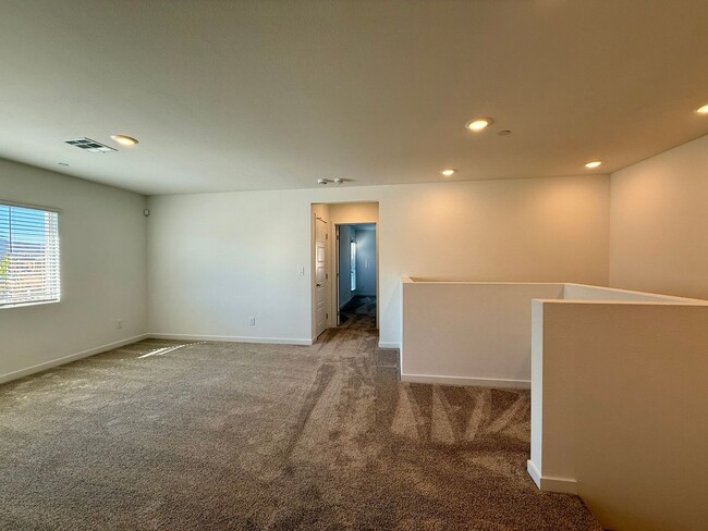 Building Photo - 4 BED 3 BATH 2 CAR GARAGE TOWNHOUSE + LOFT ON CORNER LOT w/ BALCONY