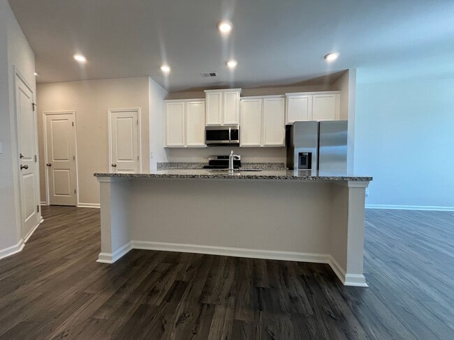 Building Photo - Spacious Townhome Available Now!