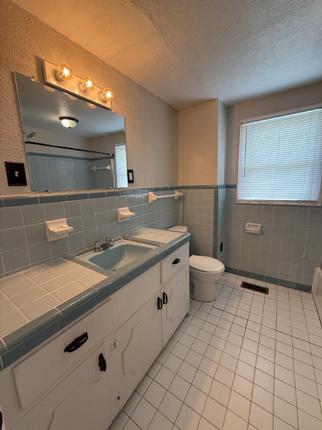 Building Photo - Will consider Section 8 "Charming 4-Bedroom Home with Hardwood Floors on Ready Section Road!"