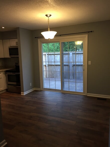 Dining room with sliding door to private deck - 6816 Ray Rd