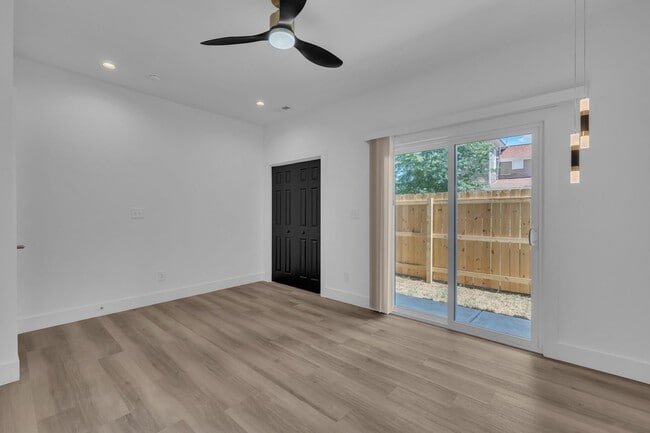 Building Photo - Modern New Construction Townhome with Roof...
