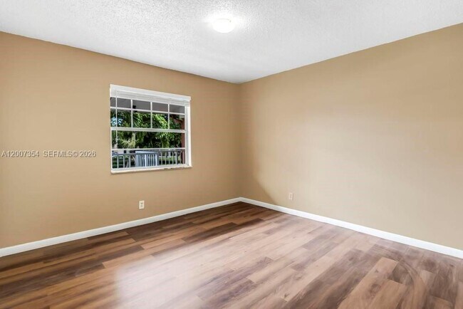 Building Photo - 3100 Coral Springs Dr