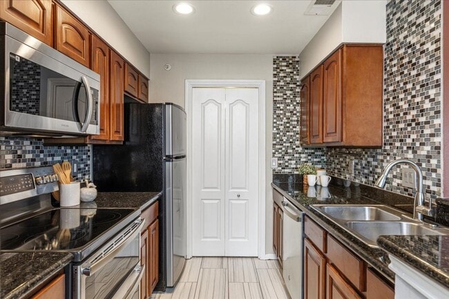 Building Photo - $1,500/mo – 2BR/1BA Condo in Northwest Austin with Stone Fireplace & Balcony