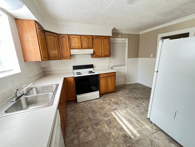 Building Photo - Denton Charmer with Big Yard, Carport & Flexible Living Space