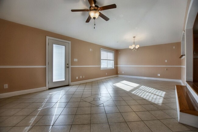 Building Photo - Pet Friendly Three Bedroom with Bonus!