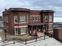 Building Photo - 110-114 N 6th Ave E
