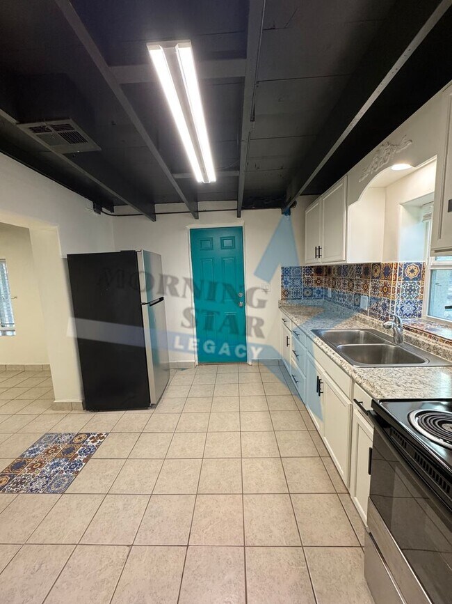 Building Photo - Charming Updated Home w/ Enclosed Yard & Storage