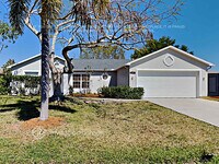 Building Photo - 5953 NW Brenda Cir