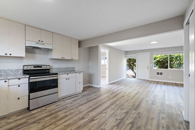 Building Photo - 2BR with dishwasher, on site laundry!