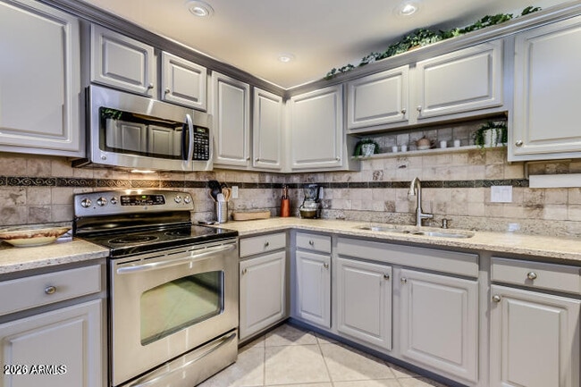 Building Photo - 9455 E Raintree Dr