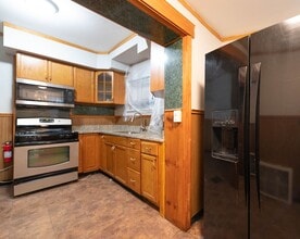 Building Photo - PHA Welcomed! Spacious Home with Private Backyard