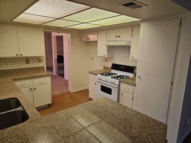 Building Photo - Spacious 4-Bedroom Home with Large Backyard & Covered Patio!