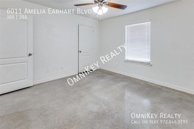 Building Photo - 6011 Amelia Earhart Blvd