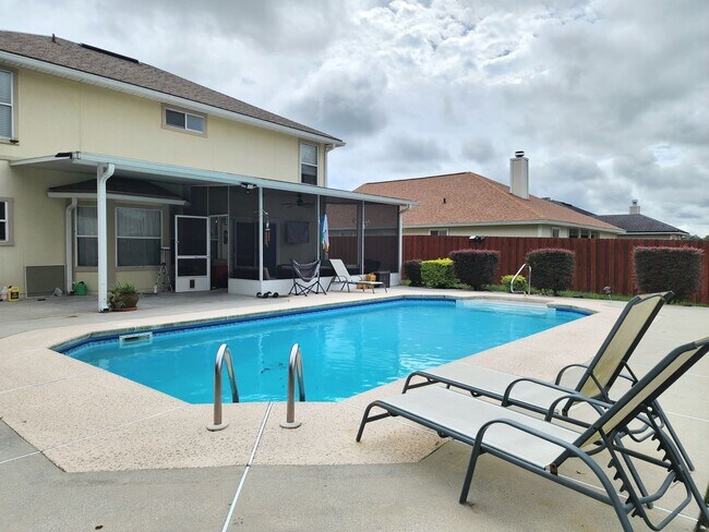 Building Photo - 4 Bedroom 2.5 Bath with in ground pool located in Lake Asbury