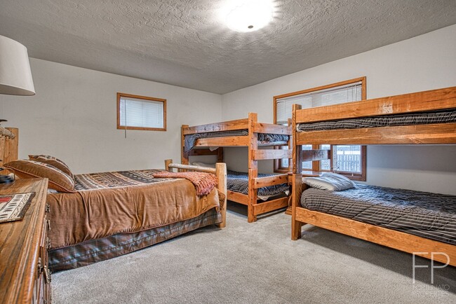 Building Photo - On the Blue River!  HUGE 4 Bedroom home, Furnished Updates throughout!  Bus route!  Spacious parking
