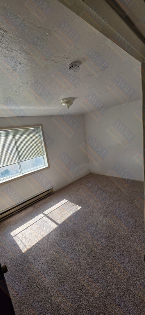 Building Photo - Available now! View Today by calling Rentl...