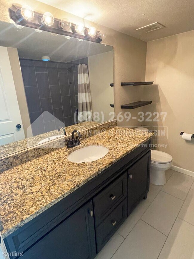 Building Photo - 1 br, 1 bath Condo - 3337 S Monaco Pkwy Un...