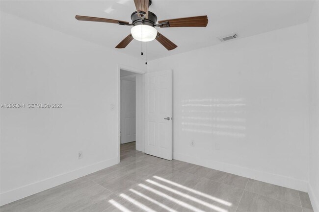 Building Photo - 9999 NW 25th Terrace