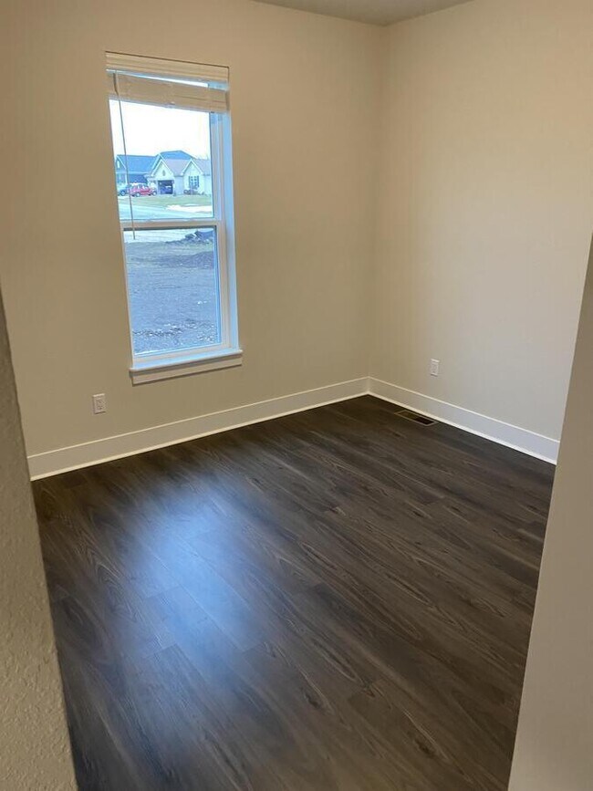 Building Photo - W218N16046 Tiger Lily Dr