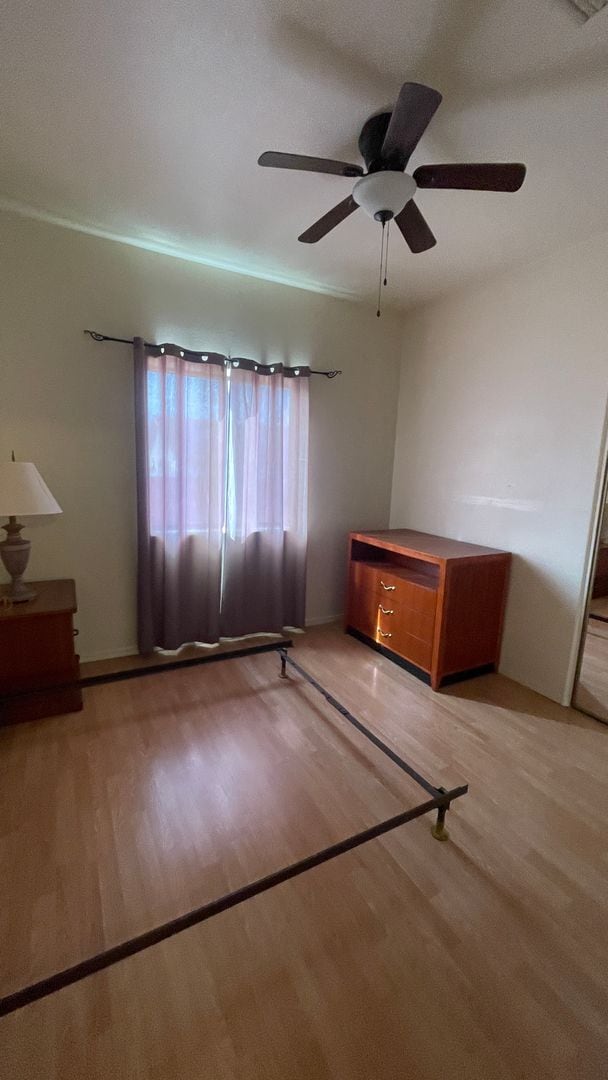 Building Photo - Modern town home with AC. 3/2. Covered, off-street parking, easy care yard.  Ample kitchen. Lamin...