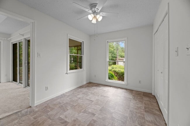 Building Photo - Live Where Others Vacation | Gated Community + Marina Access