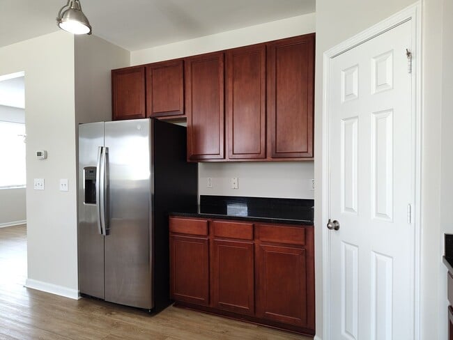 Building Photo - Pristine home located in the Woodbury comm...