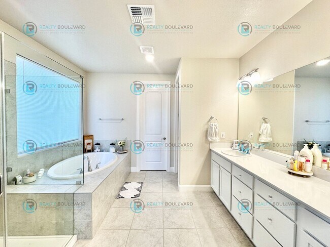 Building Photo - Welcome to your dream home, where modern elegance meets unparalleled convenience!