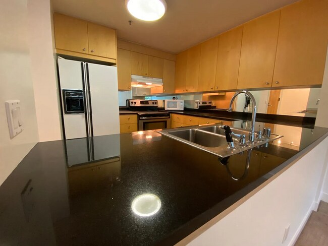 Building Photo - Stylish 1-Bedroom, 1-Bathroom Apartment in...