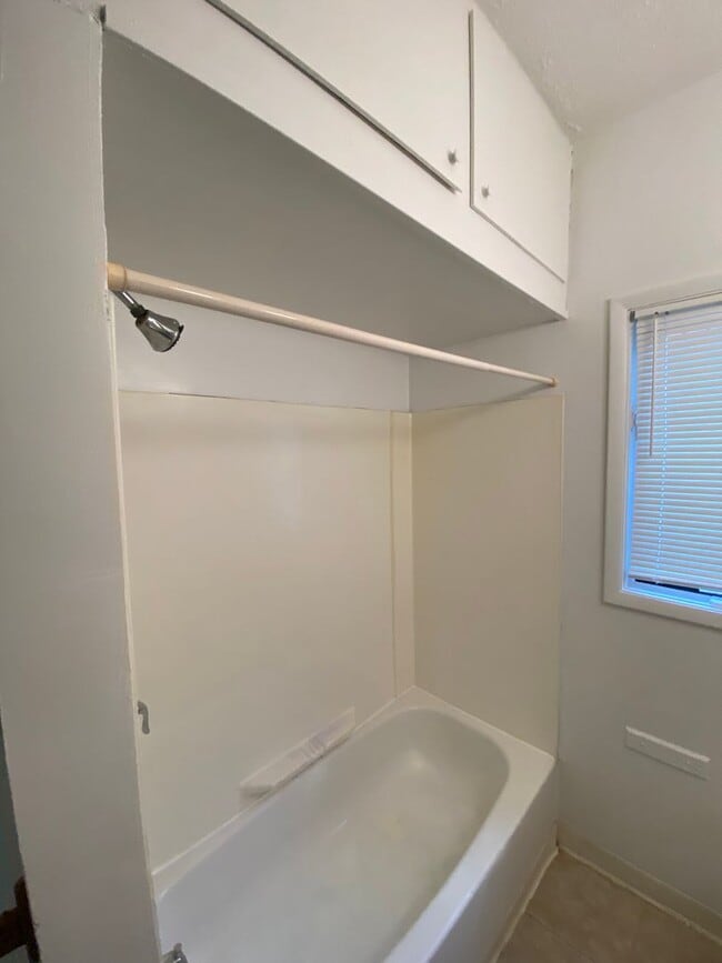 Building Photo - One Bedroom Duplex with off street parking and private enclosed porch