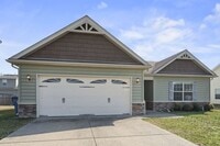 Building Photo - 3 bedroom 2 bath house for rent in abeautiful neighborhood.