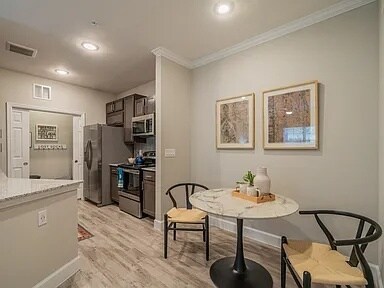 Building Photo - Affordable Comfort with Modern Style!