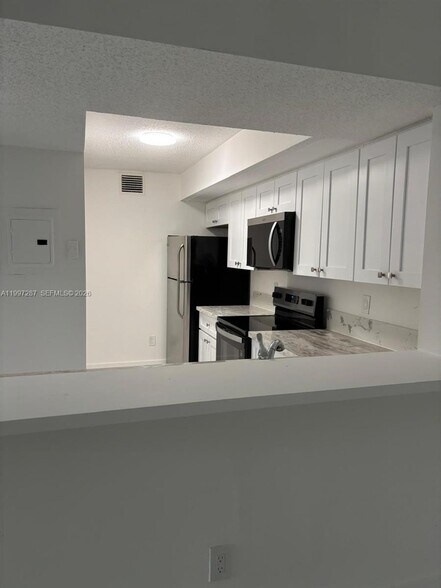 Building Photo - 18840 NW 57th Ave