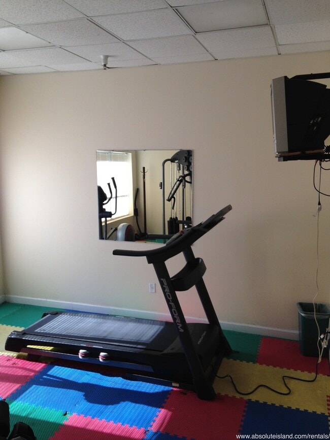 Building Photo - Beach Access, Bike Rides, Coastal Comfort.