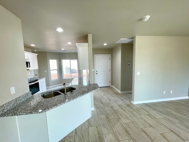 Building Photo - Cute home built in 2023 with garage and la...