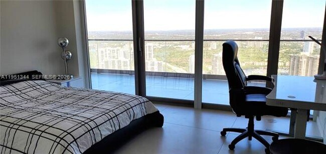 Building Photo - 18975 Collins Ave