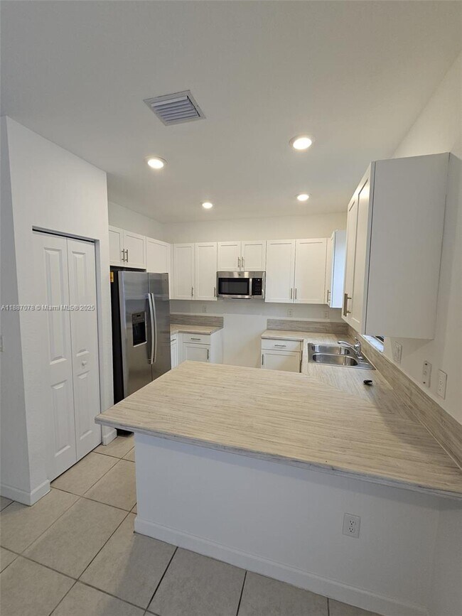 Building Photo - 11083 West 33rd Ct